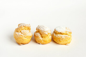Profiteroles isolated on white