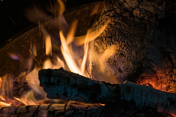 Burning coals from a fire abstract background