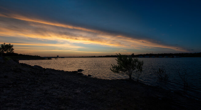 Sunrise on lake at beginning of golden hour