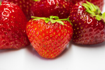 strawberry berries on a plate / ripe strawberry fruit