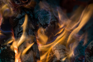 Burning coals from a fire abstract background