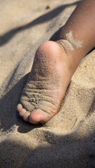 toddle foot at the beach