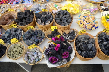 Volcano. Aeolian Islands. Sicily. Italy. October 11, 2019 - baskets with volcanic stones -...