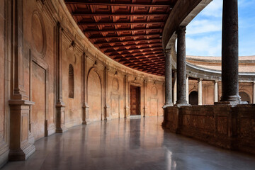 Fototapeta na wymiar Patio of The Palace of Charles V. upper part of the Circular courtyard of the The Palace of Charles V at the Alhambra in Granada, Spain.