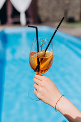 Dessert on the festive table. Glasses with berries and fruits. Fruit salad. Juices and drinks.

