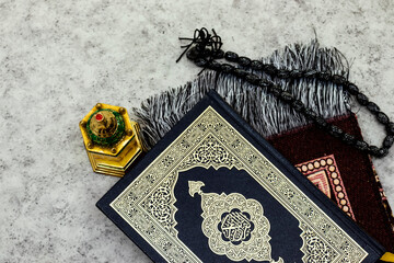 Ornamental Arabic lantern oud perfume with black rosary, prayer mat Ramadan Kareem Greeting Card. Ramadan Mubarak. Translated: Happy & Holy Ramadan. Month of fasting for Muslims.