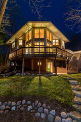Luxury Home in the Woods at Night © james_pintar