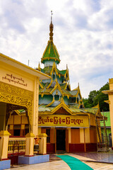 It's Mahamuni Buddha Temple, a Buddhist pagoda and major pilgrimage site, located southwest of Mandalay, Myanmar (Burma)