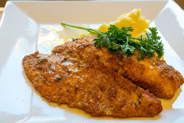 Parmesan Crusted Tilapia with Potatoes with a Beurre Blanc 