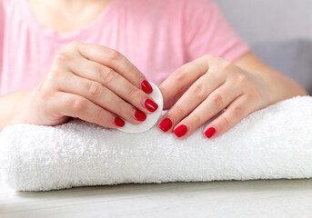 Obraz na płótnie Canvas Manicured nails with red polish. Manicure with bright nail polish.