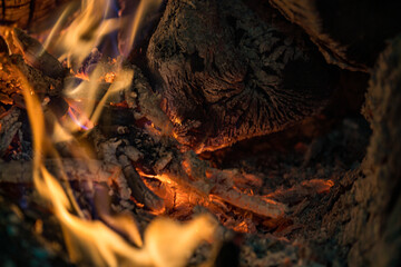 Burning coals from a fire abstract background