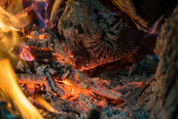 Burning coals from a fire abstract background
