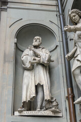 Florence, Italy - March 1, 2019: Galileo Galilei Statue outside the Uffizi Gallery in Florence