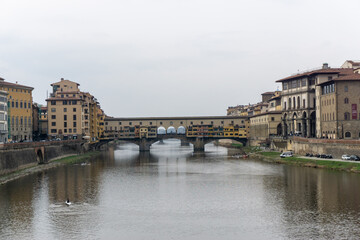 Fototapeta na wymiar Ponte Vecchio the famous Arch bridge in Florence on Arno river, Tuscany, Italy