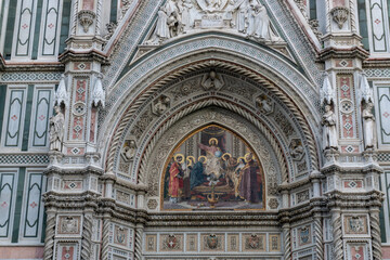 Fototapeta na wymiar Details of Cathedral of Saint Mary of the Flower, called Cattedrale di Santa Maria del Fiore in Florence Tuscany from Uffizi Gallery. Also known Cathedral of Florence or Duomo Di Firenze.