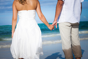 Fototapeta na wymiar Destination wedding on a white sand beach during summer.