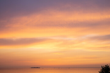 sunset over the sea and clouds