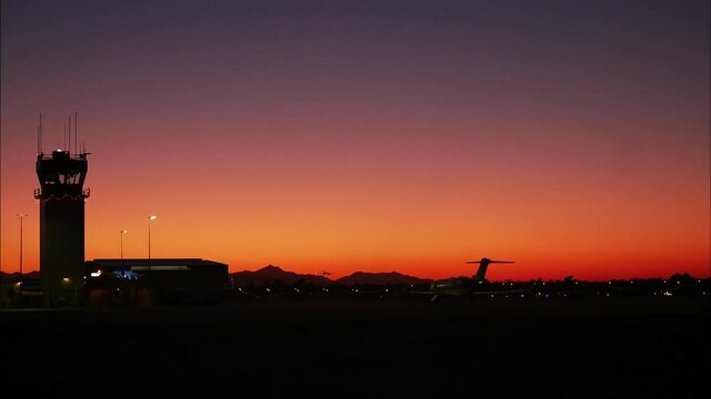 A sunset time lapse at Falcon field a desert airport in Mesa Arizona.