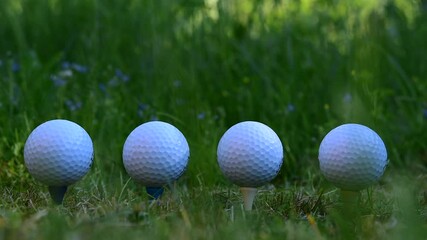 Golf balls that symbolize when one falls so everyone follows along with the stock market downturn and the pandemic in society. - Powered by Adobe