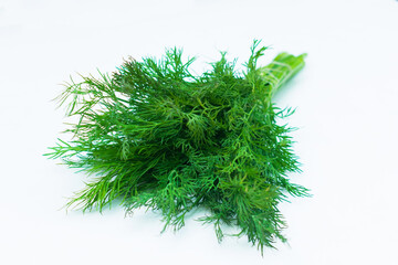 
A bunch of dill on a white background.
Close-up.