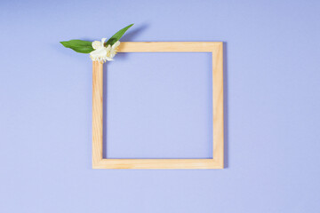 wooden frame with flowers on paper background