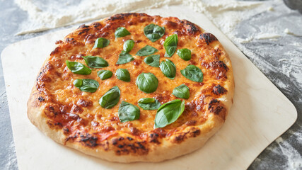 Italian pizza with basil, dark moody and clean shot,