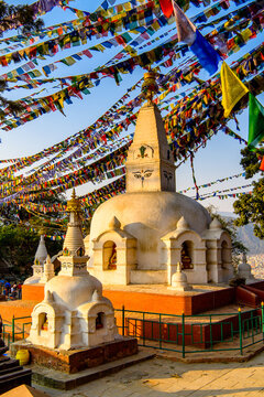 Colorful flags in Swayambhunath (Swayambu or Swoyambhu), an ancient religious architecture atop a hill, Kathmandu, Nepal