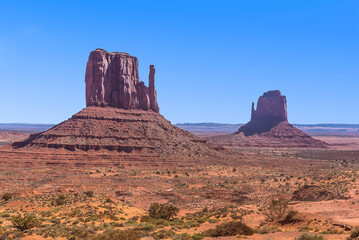 A view towards East and West Mittens Buttes in Monument Valley tribal park in springtime
