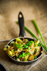 stewed zucchini with eggplant, mushrooms, onions and other vegetables