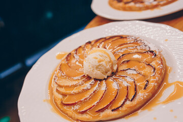 Eat sweet dessert cuisine tart Pancake in cafe menu.Pastry products close up.Delicious menu item in restaurant.Enjoy fresh Layered cake vanilla custard served fruit slices peach exotic cream pie Diet.