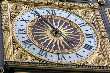 Fototapeta na wymiar The Conciergerie clock in old Paris, built between 1350 and 1353, the oldest public clock in Paris, France