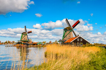 It's Windmill in Zaanse Schans, quiet village in Netherlands, province North Holland