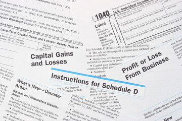 IRS Federal Income Tax Forms, Schedule D, 1040, Capital              Gains and Losses, Profit or Loss from Business, Disaster Collage 