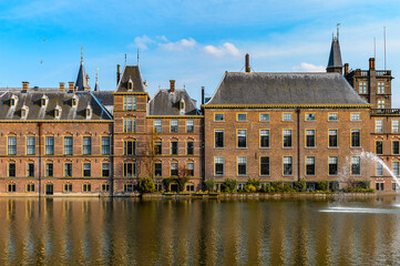 Fototapeta na wymiar It's The Ridderzaal in Binnenhof with the Hofvijver lake. Meeting place of States General of the Netherlands, the Ministry of General Affairs and the office of the Prime Minister of Netherlands