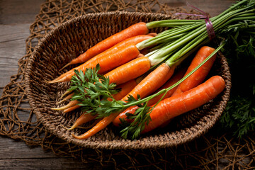 fresh ripe carrots in a basket