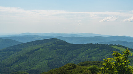 Fototapeta premium View from Chmelova hill above Vrsatske Podhradie village in Biele Karpaty mountains in Slovakia