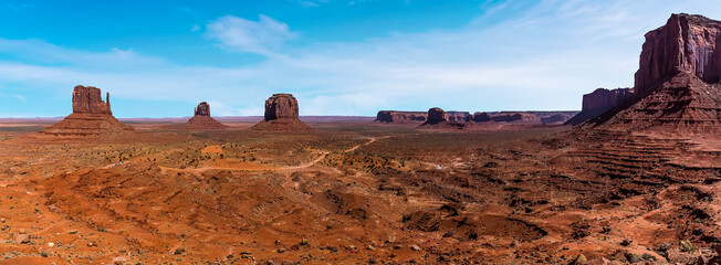John Ford's view showing East Mitten Butte, West Mitten Butte, Merrick, Butte, Cly Butte, Camel Butte in Monument Valley tribal park in springtime