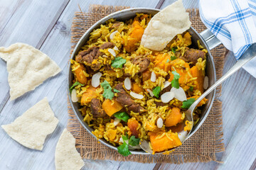Lamb and apricot biryani with sweet potatoes - overhead view