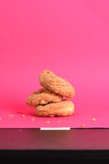 sugar donuts pink background 