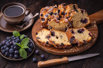 Homemade blueberry cake and cup of coffee.