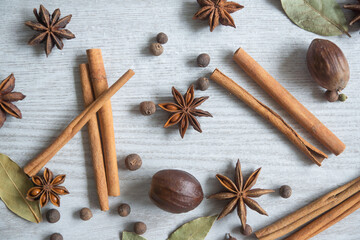 Dry seasonings and spices against a dark background view from the top.