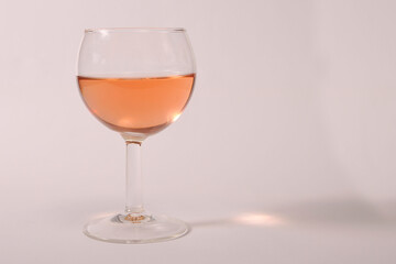 glass of rose wine close up