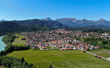 Fototapeta na wymiar Aerial view over the city of Fuessen in Bavaria, Germany - home of the famous Bavarian King Ludwig Castles