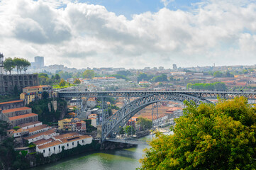 Fototapeta na wymiar Panorama of the Bridge Dom Luis I over the River Douro in Porto, Portugal