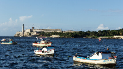 Fototapeta na wymiar Marine landscape with fishing boats in Havana, Cuba.
