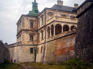 Fototapeta na wymiar Old Pidhirtsi Castle is a residential castle-fortress located in western Ukraine, eighty kilometers east of Lviv, village Podgortsy