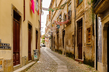 Narrow street of the Historic center of Coimbra, Portugal. World Heritage site by UNESCO since 2013