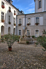Fototapeta na wymiar Historic church with cobblestones in in Salzburg, Austria