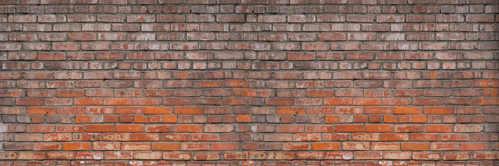 Background Of Old Vintage Brown and Red Brick Wall. Shabby Building Facade. Long Panoramic Banner.