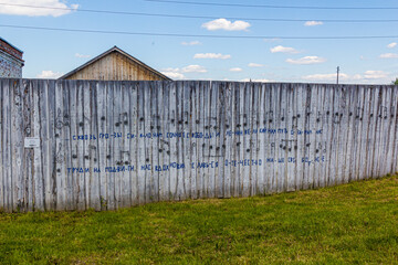 PERM KRAI, RUSSIA - JULY 1, 2018: Fence with a song lyrcs in the Museum of the History of Political Repression Perm-36 (Gulag Museum), Russia